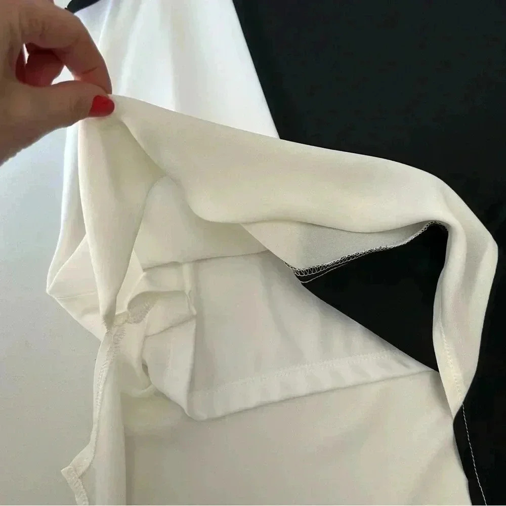 Ricki’s Blouse Sheer Sleeveless Asymmetric Flowy Top Black White Size Small - Picture 10 of 14
